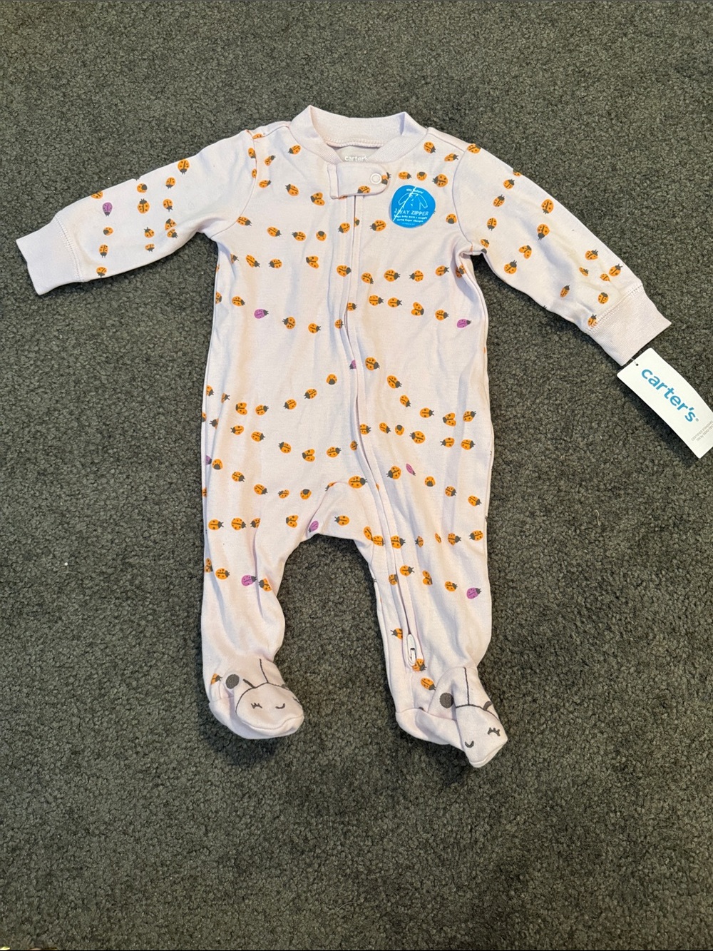 Carter's Lilac 2 Way Zipper Footed Onesie PJ with Adorable Lady Bug Print.